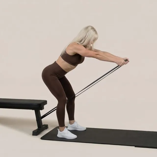 banded biceps to shoulder raise — starting position