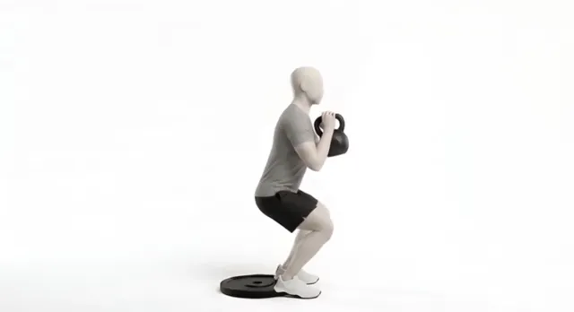 Kettlebell elevated squat — starting position